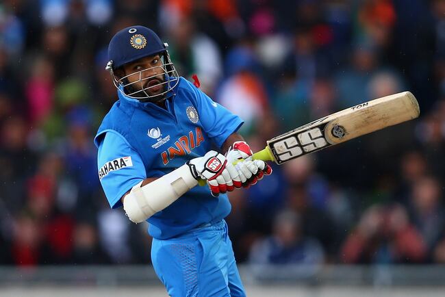 Hi-res-171207686-shikhar-dhawan-of-india-hits-out-during-the-icc_crop_north