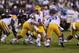 Oct 5, 2013; Starkville, MS, USA; LSU Tigers quarterback Zach Mettenberger (8) prepares for a handoff during the game against the Mississippi State Bulldogs at Davis Wade Stadium. Mandatory Credit: Spruce Derden-USA TODAY Sports