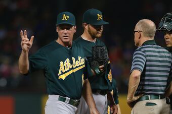 Hi-res-180510042-brett-anderson-of-the-oakland-athletics-talks-with-the_crop_north