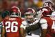 FAYETTEVILLE, AR - SEPTEMBER 28: Johnny Manziel #2 of the Texas A&M Aggies talks to Rohan Gaines #26 of the Arkansas Razorbacks at Razorback Stadium on September 28, 2013 in Fayetteville, Arkansas. (Photo by Wesley Hitt/Getty Images)