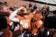 Oct 12, 2013; Dallas, TX, USA; Texas Longhorns quarterback Case McCoy (6) celebrates with the Golden Hat Trophy after the game against the Oklahoma Sooners during the Red River Rivalry at the Cotton Bowl Stadium. The Texas Longhorns beat the Oklahoma Sooners 36-20. Mandatory Credit: Matthew Emmons-USA TODAY Sports