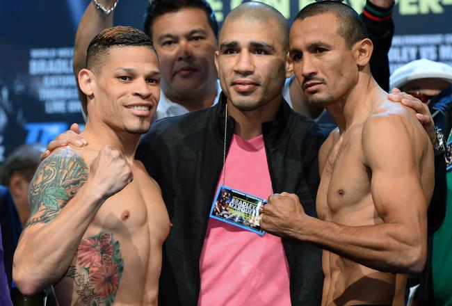 Hi-res-184163865-boxer-miguel-cotto-stands-between-boxers-orlando-cruz_crop_north