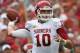 DALLAS, TX - OCTOBER 12: Blake Bell #10 of the Oklahoma Sooners looks for an open receiver in the first quarter against the Texas Longhorns at the Cotton Bowl on October 12, 2013 in Dallas, Texas. (Photo by Tom Pennington/Getty Images)