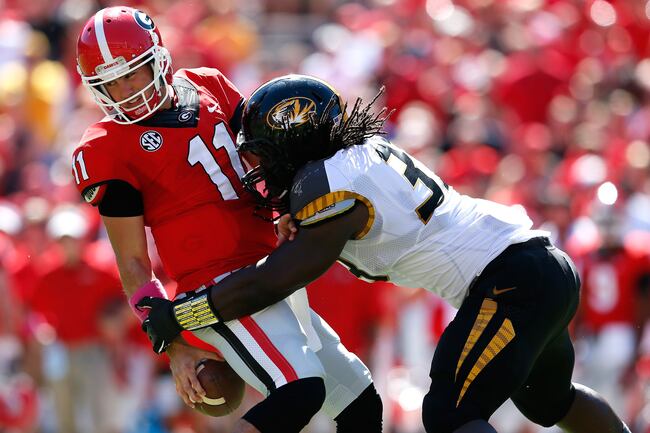Hi-res-184228310-markus-golden-of-the-missouri-tigers-sacks-aaron-murray_crop_north