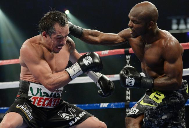 Hi-res-184273675-welterweight-champion-timothy-bradley-jr-lands-a-punch_crop_north
