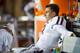 OXFORD, MS - OCTOBER 12: Quarterback Johnny Manziel #2 of the Texas A&M Aggies is tended to after being injured during a game against the Ole Miss Rebels on October 12, 2013 at Vaught-Hemingway Stadium in Oxford, Mississippi. At halftime Texas A&M leads Ole Miss 14-10. (Photo by Michael Chang/Getty Images)