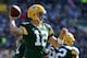 GREEN BAY, WI - OCTOBER 06: Aaron Rodgers #12 of the Green Bay Packers passes during the third quarter against the Detroit Lions at Lambeau Field on October 6, 2013 in Green Bay, Wisconsin. Green Bay would win 22-9. (Photo by Harry How/Getty Images)