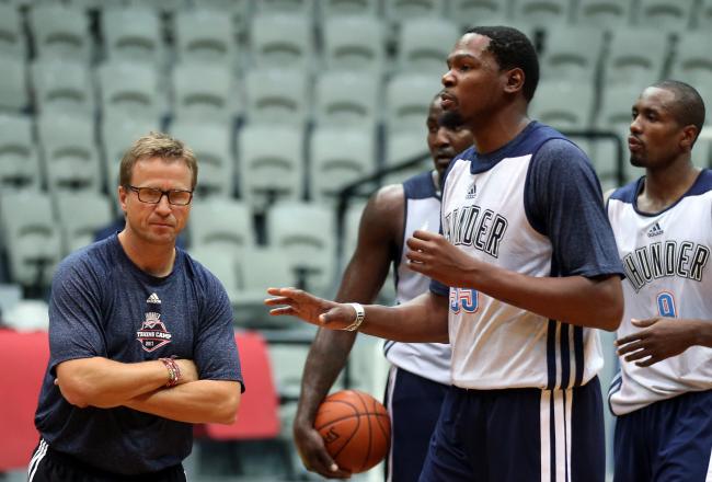 Hi-res-183112670-head-coach-scott-brooks-and-kevin-durant-of-the_crop_north