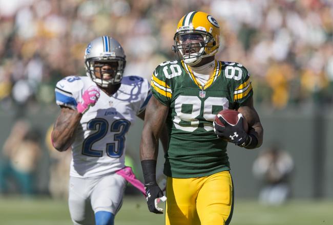 Hi-res-183452925-james-jones-of-the-green-bay-packers-runs-during-a-83_crop_north