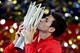 SHANGHAI, CHINA - OCTOBER 13: Novak Djokovic of Serbia poses for photographers with the winner's trophy after defeating Juan Martin Del Potro of Argentina during the final of the Shanghai Rolex Masters at the Qi Zhong Tennis Center on October 13, 2013 in Shanghai, China. (Photo by Matthew Stockman/Getty Images)