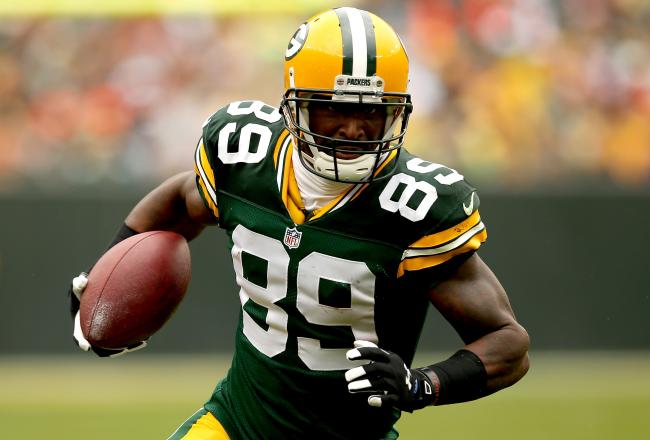 Hi-res-180648101-james-jones-of-the-green-bay-packers-runs-after-making_crop_north