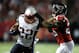Sep 29, 2013; Atlanta, GA, USA; New England Patriots running back Stevan Ridley (22) straight arms Atlanta Falcons safety William Moore (25) during the second half at Georgia Dome. The Patriots defeated the Falcons 30-23. Mandatory Credit: Dale Zanine-USA TODAY Sports
