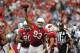 Sep 15, 2013; Phoenix, AZ, USA; Arizona Cardinals defensive tackle Calais Campbell (93) holds up the ball after recovering the fumbled ball in the third quarter against the Detroit Lions at University of Phoenix Stadium. Mandatory Credit: Jennifer Hilderbrand-USA TODAY Sports
