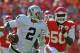 KANSAS CITY, MO - OCTOBER 13: Quarterback Terrelle Pryor #2 of the Oakland Raiders rushes up field against pressure from linebacker Justin Houston #50 of the Kansas City Chiefs during the second half on October 13, 2013 at Arrowhead Stadium in Kansas City, Missouri. Kansas City won 24-7. (Photo by Peter Aiken/Getty Images)