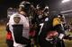 PITTSBURGH, PA - JANUARY 15: Quarterback Ben Roethlisberger #7 of the Pittsburgh Steelers speaks with quarterback Joe Flacco #5 of the Baltimore Ravens following the AFC Divisional Playoff Game at Heinz Field on January 15, 2011 in Pittsburgh, Pennsylvania. The Steelers defeated the Ravens 31-24. (Photo by Nick Laham/Getty Images)