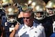 SOUTH BEND, IN - SEPTEMBER 28: Head coach Brian Kelly of the Notre Dame Fighting Irish waits torun onto the field with his team before a game against the Oklahoma Sooners at Notre Dame Stadium on September 28, 2013 in South Bend, Indiana. Oklahoma defeated Notre Dame 35-21. (Photo by Jonathan Daniel/Getty Images)