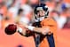 Oct 13, 2013; Denver, CO, USA; Denver Broncos quarterback Peyton Manning (18) prepares to pass in the second quarter against the Jacksonville Jaguars at Sports Authority Field at Mile High. Mandatory Credit: Ron Chenoy-USA TODAY Sports