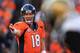 DENVER, CO - OCTOBER 13: Quarterback Peyton Manning #18 of the Denver Broncos directs the offense against the Jacksonville Jaguars at Sports Authority Field at Mile High on October 13, 2013 in Denver, Colorado. The Broncos defeated the Jaguars 35-19. (Photo by Doug Pensinger/Getty Images)