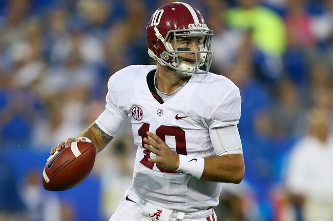 Hi-res-184237193-mccarron-of-the-alabama-crimson-tide-throws-a-pass_crop_north