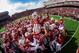 LINCOLN, NE - OCTOBER 5: Wide receiver Jamal Turner #10 of the Nebraska Cornhuskers jumps on the shoulders of his teammates before their game against the Illinois Fighting Illini at Memorial Stadium on October 5, 2013 in Lincoln, Nebraska. (Photo by Eric Francis/Getty Images)