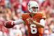 DALLAS, TX - OCTOBER 12: Case McCoy #6 of the Texas Longhorns looks for an open receiver in the first quarter against the Oklahoma Sooners at the Cotton Bowl on October 12, 2013 in Dallas, Texas. (Photo by Tom Pennington/Getty Images)
