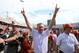Oct 12, 2013; Dallas, TX, USA; Texas Longhorns head coach Mack Brown celebrates with his team after a victory against the Oklahoma Sooners for the Red River Rivalry. The Texas Longhorns beat the Oklahoma Sooners 36-20. Mandatory Credit: Matthew Emmons-USA TODAY Sports