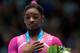 ANTWERPEN, BELGIUM - OCTOBER 04: Simone Biles of USA poses after winning the Womens All-Round Final on Day Five of the Artistic Gymnastics World Championships Belgium 2013 held at the Antwerp Sports Palace on October 4, 2013 in Antwerpen, Belgium. (Photo by Dean Mouhtaropoulos/Getty Images)