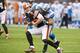 CLEVELAND, OH - OCTOBER 13: Quarterback Brandon Weeden #3 of the Cleveland Browns is sacked by defensive tackle Ndamukong Suh #90 of the Detroit Lions during the second half at FirstEnergy Stadium on October 13, 2013 in Cleveland, Ohio. The Lions defeated the Browns 31-17. (Photo by Jason Miller/Getty Images)