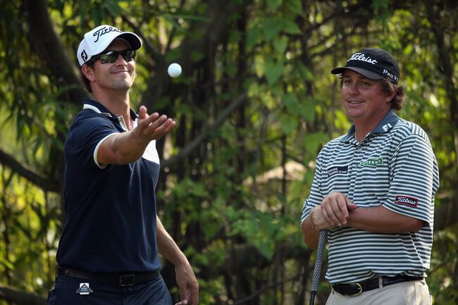 Hi-res-155090004-adam-scott-of-australia-and-jason-dufner-of-the-usa_crop_north