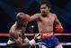 LAS VEGAS, NV - JUNE 09: (R-L) Manny Pacquiao lands a right to the head of Timothy Bradley during their WBO welterweight title fight at MGM Grand Garden Arena on June 9, 2012 in Las Vegas, Nevada. (Photo by Kevork Djansezian/Getty Images)