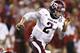 FAYETTEVILLE, AR - SEPTEMBER 28: Johnny Manziel #2 of the Texas A&M Aggies rolls out of the pocket against the Arkansas Razorbacks at Razorback Stadium on September 28, 2013 in Fayetteville, Arkansas. (Photo by Wesley Hitt/Getty Images)