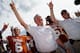 DALLAS, TX - OCTOBER 12: Case McCoy #6 of the Texas Longhorns and head coach Mack Brown of the Texas Longhorns celebrate after the Longhorns beat the Oklahoma Sooners 36-20 at the Cotton Bowl on October 12, 2013 in Dallas, Texas. (Photo by Tom Pennington/Getty Images)