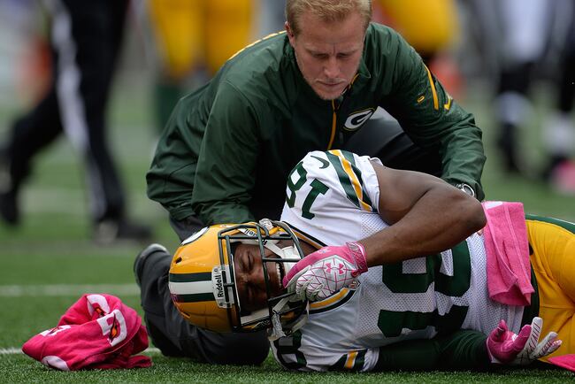 Hi-res-184410458-randall-cobb-of-the-green-bay-packers-is-attended-to-by_crop_north