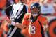 DENVER, CO - OCTOBER 13: Quarterback Peyton Manning #18 of the Denver Bronco reacts after a play against the Jacksonville Jaguars at Sports Authority Field at Mile High on October 13, 2013 in Denver, Colorado. The Broncos defeated the Jaguars 35-19. (Photo by Doug Pensinger/Getty Images)