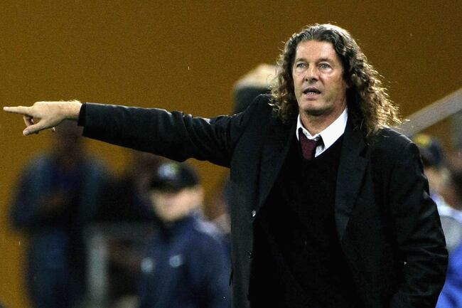 Hi-res-83280321-qatari-coach-bruno-metsu-gives-his-players-instructions_crop_north