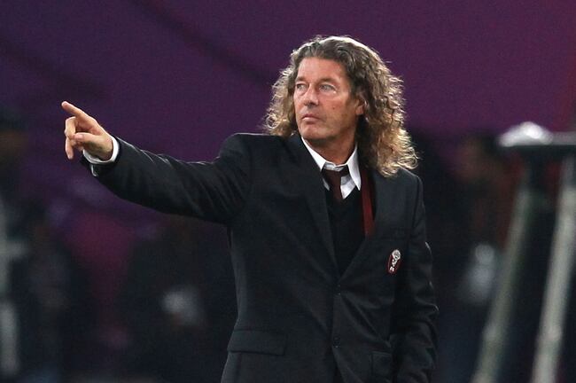 Hi-res-108007005-qatari-coach-bruno-metsu-gestures-during-the-afc-asian_crop_north