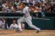 Sep 28, 2013; Houston, TX, USA; New York Yankees second baseman Robinson Cano (24) gets a hit during the sixth inning against the Houston Astros at Minute Maid Park. Mandatory Credit: Troy Taormina-USA TODAY Sports