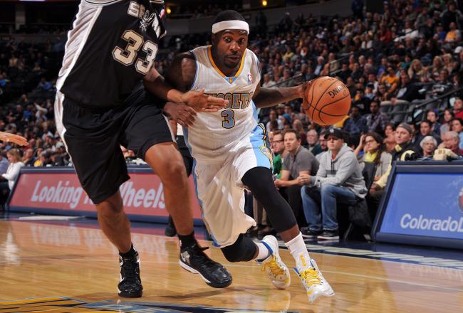 Hi-res-184634996-ty-lawson-of-the-denver-nuggets-drives-to-the-basket_crop_north