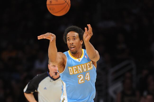 Hi-res-183488224-andre-miller-of-the-denver-nuggets-passes-the-ball-up_crop_north
