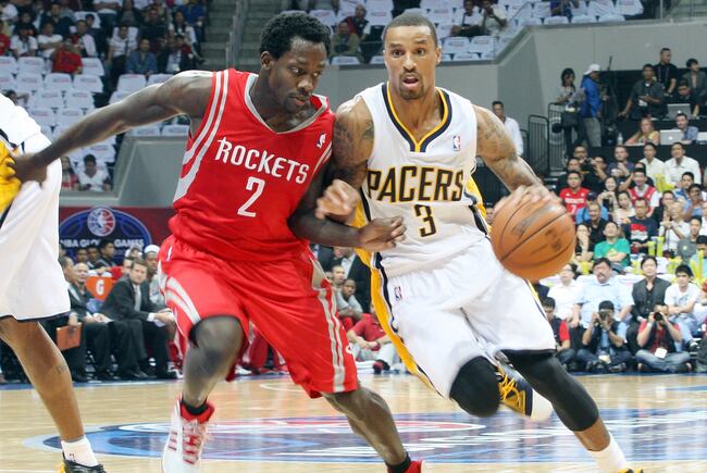 Hi-res-183968104-george-hill-of-the-indiana-pacers-dribbles-past-patrick_crop_north