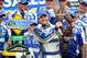 Jul 14, 2013; Loudon, NH, USA; NASCAR Sprint Cup Series driver Brian Vickers celebrates winning the Camping World RV Sales 301 at New Hampshire Motor Speedway. Mandatory Credit: Joe Camporeale-USA TODAY Sports
