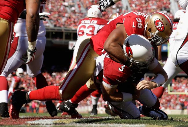 Hi-res-184419496-corey-lemonier-of-the-san-francisco-49ers-sacks-carson_crop_north