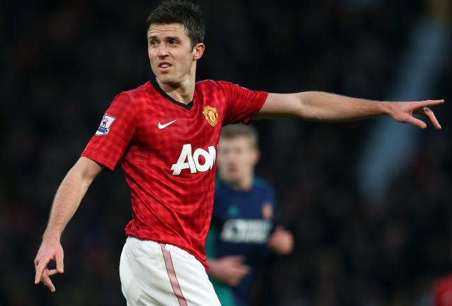 Hi-res-158395590-michael-carrick-of-manchester-united-gives-instructions_crop_north