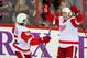 Dan DeKeyser and Stephen Weiss celebrate an overtime goal against Carolina.