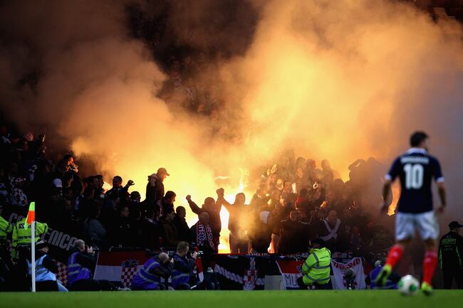 Hi-res-184702772-croatian-fans-light-flares-during-the-fifa-2014-world_crop_north