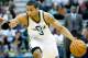 Oct 8, 2013; Salt Lake City, UT, USA; Utah Jazz point guard Trey Burke (3) dribbles toward the basket during the second half against the Golden State Warriors at EnergySolutions Arena. The Jazz won 101-78. Mandatory Credit: Russ Isabella-USA TODAY Sports