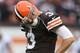 Oct 13, 2013; Cleveland, OH, USA; Cleveland Browns quarterback Brandon Weeden (3) reacts after missing a throw against the Detroit Lions during the second quarter at FirstEnergy Stadium. Mandatory Credit: Ron Schwane-USA TODAY Sports