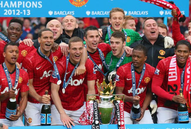 Hi-res-168615612-the-manchester-united-players-celebrate-with-the_crop_north