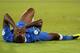 NAPLES, ITALY - OCTOBER 15: Mario Balotelli of Italy dejected during the FIFA 2014 World Cup qualifier group B match between Italy and Armenia at Stadio San Paolo on October 15, 2013 in Naples, Italy. (Photo by Claudio Villa/Getty Images)
