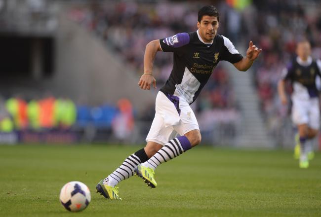 Hi-res-182300134-luis-suarez-of-liverpool-in-action-during-the-barclays_crop_north